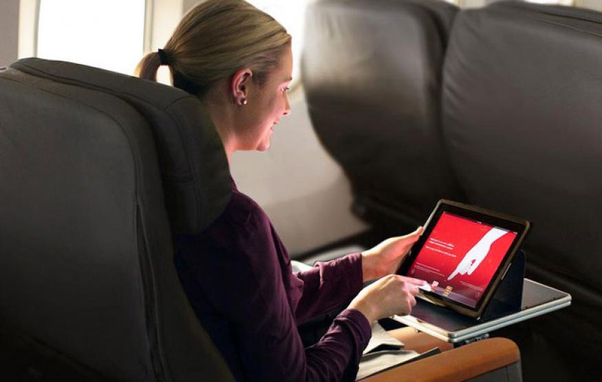 Qantas and Virgin customers can now keep their phones on for entire flight ...