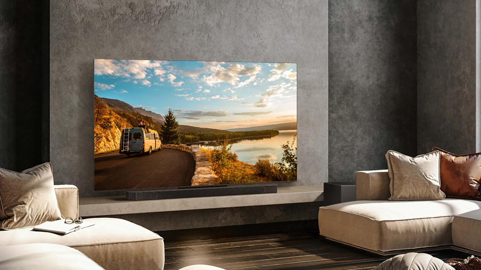 Samsung’s flagship soundbar range is the Q-Series, with the products delivering optimised sound with nuance and multi-dimensional clarity, in harmony to your space. Image simulated for illustrative purposes. TV sold separately.